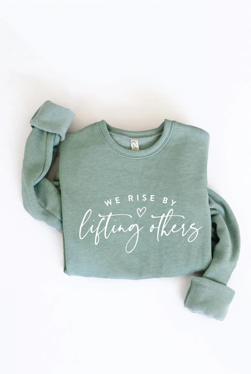 We Rise By Lifting Others Graphic Sweatshirt by Oat Collective